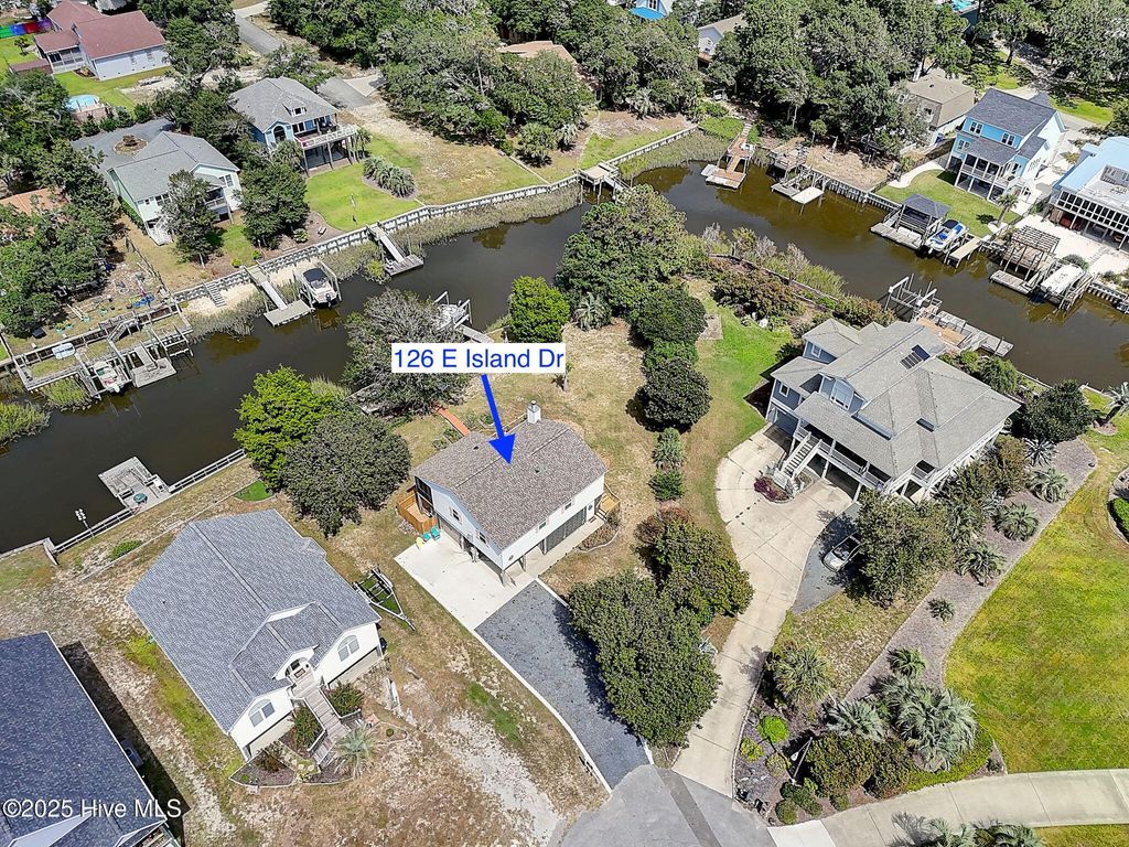 Photo of 126 E Island Drive, Oak Island, NC 28465 (MLS # 100526296)