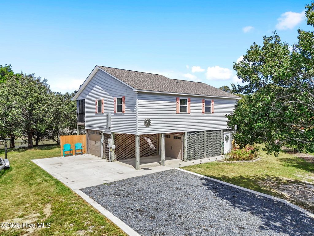 Photo of 126 E Island Drive, Oak Island, NC 28465 (MLS # 100526296)