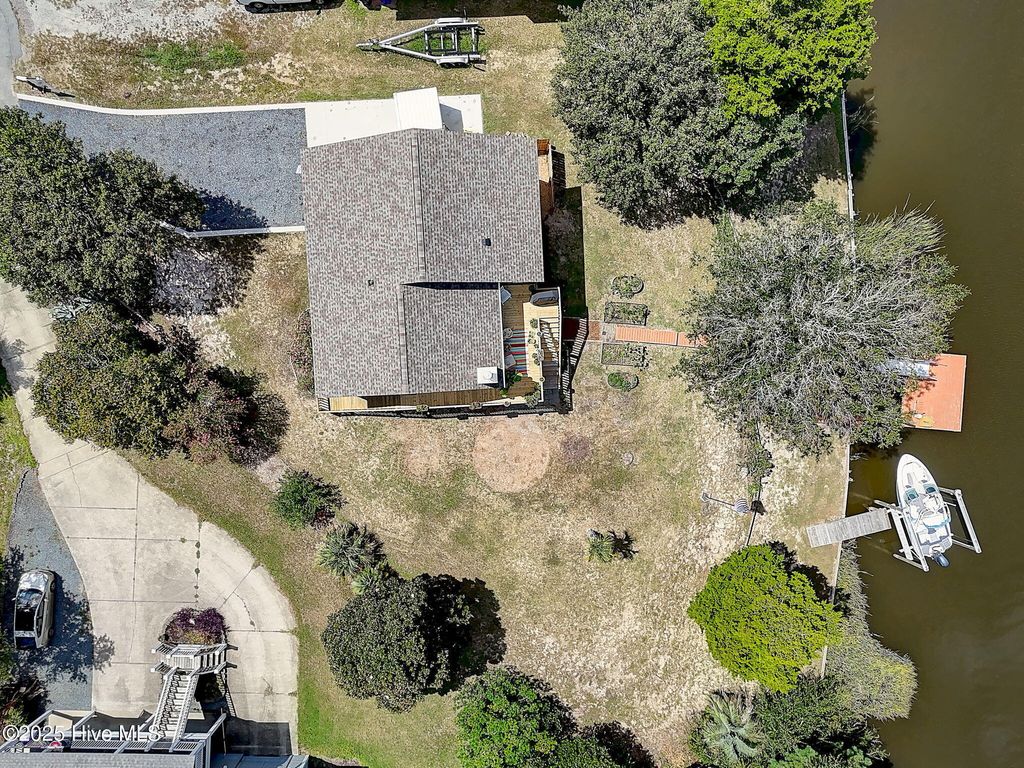 Photo of 126 E Island Drive, Oak Island, NC 28465 (MLS # 100526296)