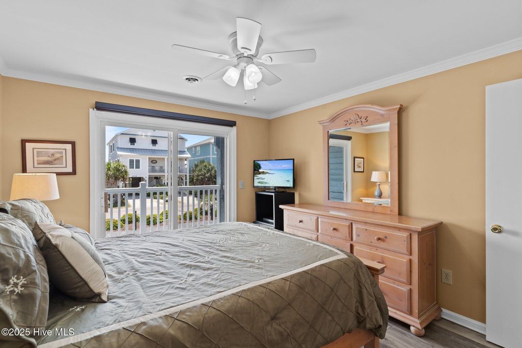 Photo of 2714 W Beach Drive # 104, Oak Island, NC 28465 (MLS # 100502649)