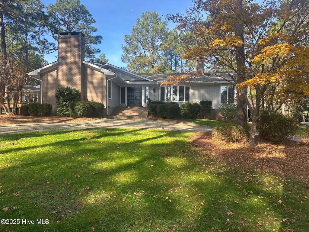 Photo of 1 Country Club Boulevard, Whispering Pines, NC 28327 (MLS # 100542456)