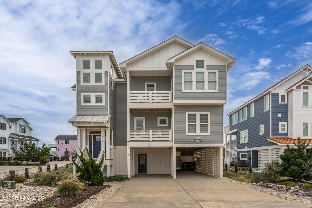 Photo of 640 Tide Arch, Corolla, NC 27927 (MLS # 100515343)