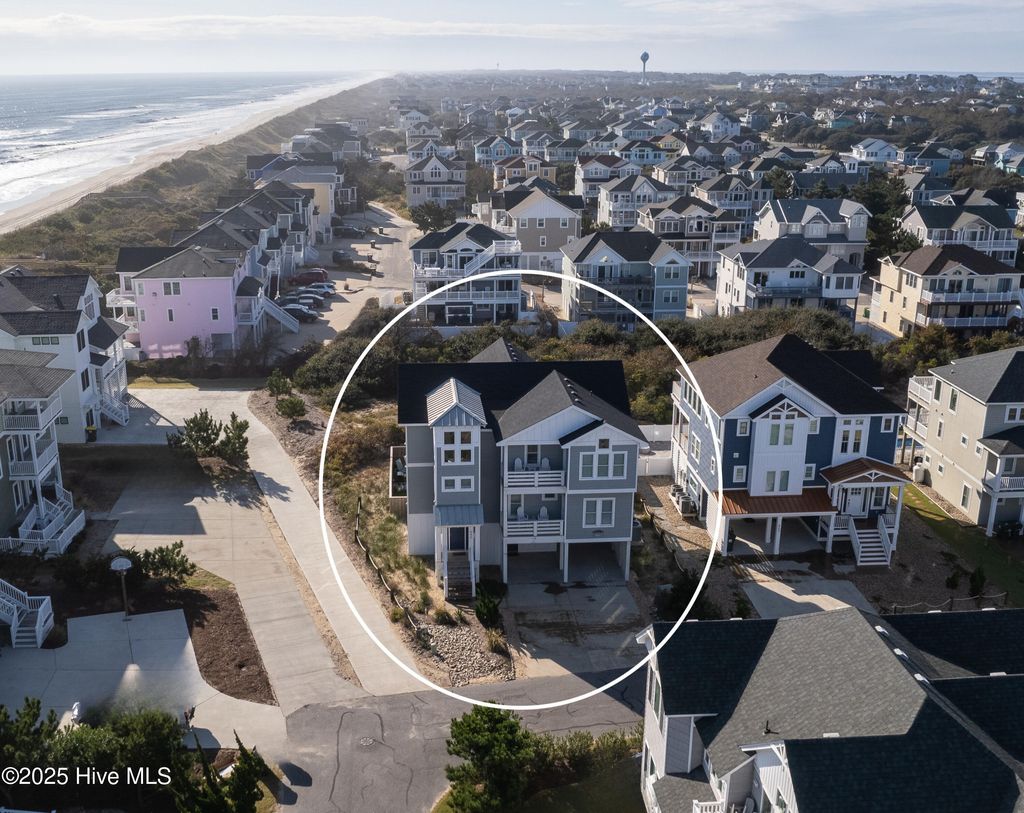 Photo of 640 Tide Arch, Corolla, NC 27927 (MLS # 100515343)
