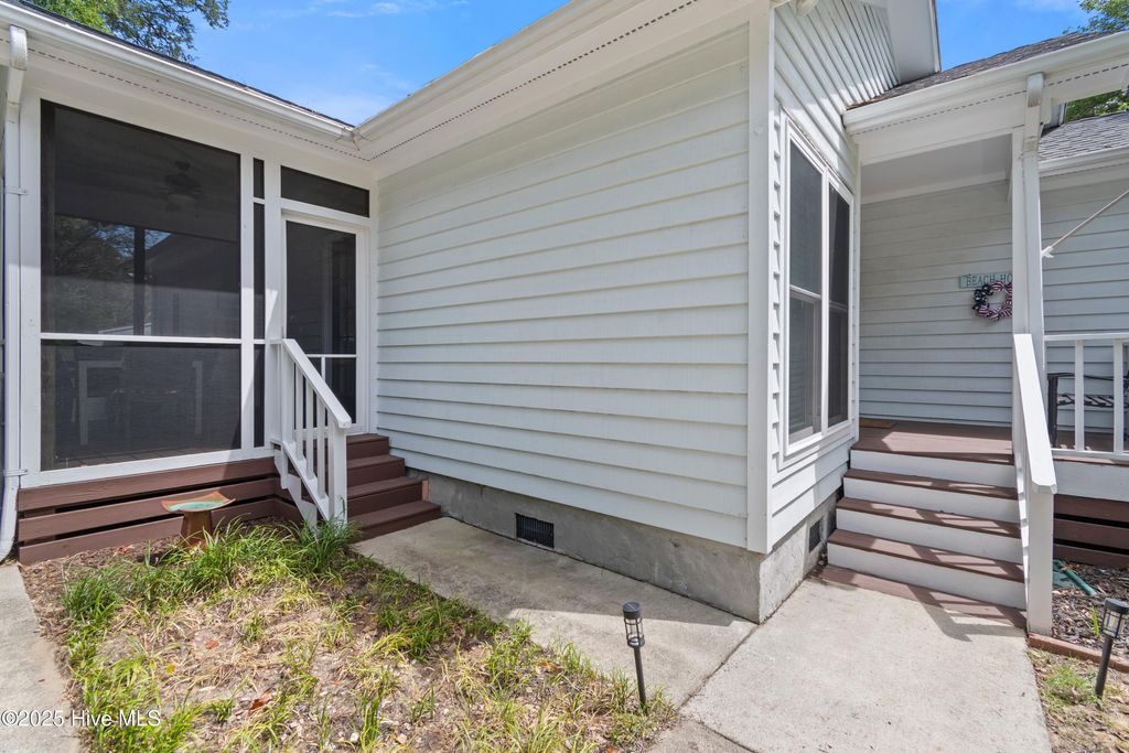 Photo of 120 SE 2nd Street, Oak Island, NC 28465 (MLS # 100522273)