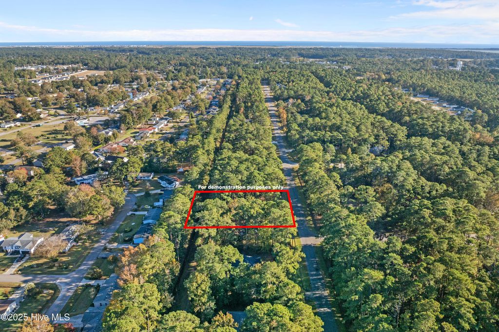 Photo of 39 Pinewood Drive, Carolina Shores, NC 28467 (MLS # 100540342)