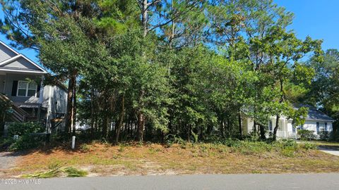 Photo of 142 NE 17th Street, Oak Island, NC 28465 (MLS # 100536370)