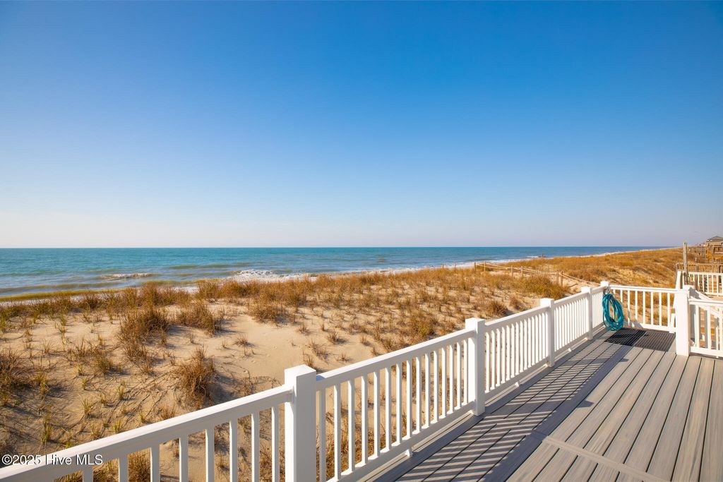 Photo of 1321 W Beach Drive, Oak Island, NC 28465 (MLS # 100530281)