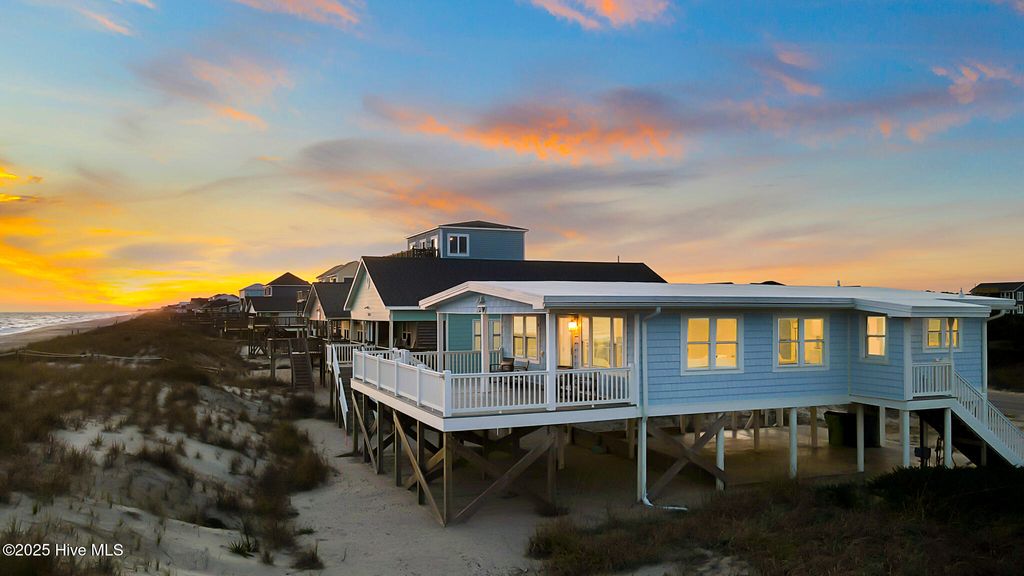 Photo of 1321 W Beach Drive, Oak Island, NC 28465 (MLS # 100530281)