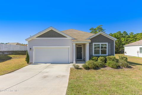 Photo of 1803 St Patricks Court SE, Bolivia, NC 28422 (MLS # 100538359) Photo of 1803 St Patricks Court SE, Bolivia, NC 28422 (MLS # 100538359)