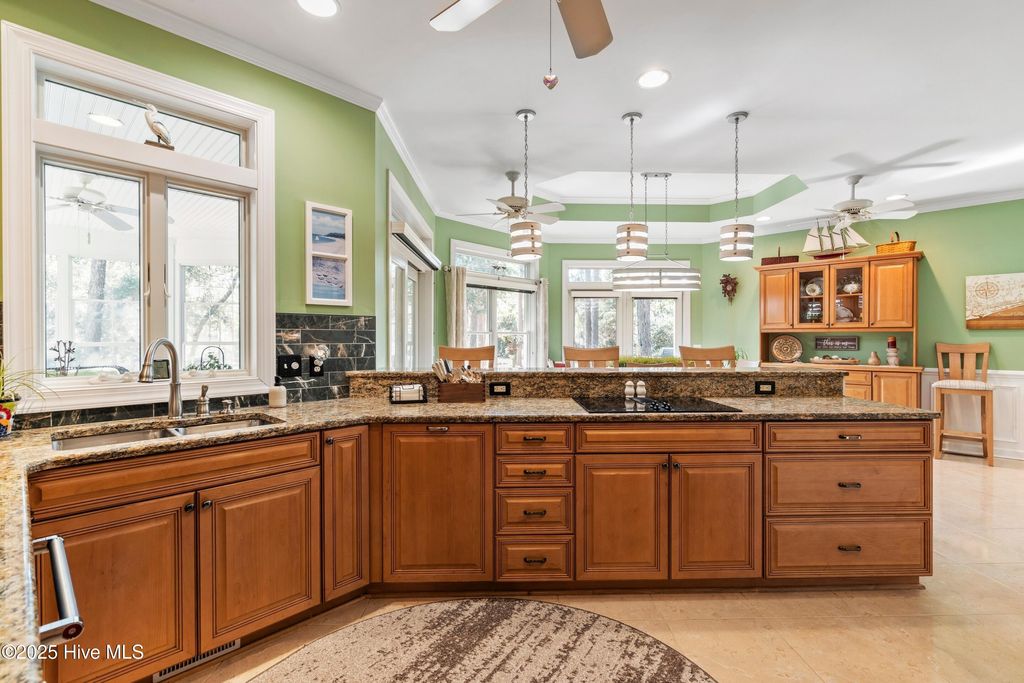 Photo of 501 Periwinkle Way, Caswell Beach, NC 28465 (MLS # 100533404)
