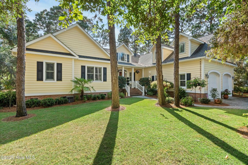 Photo of 501 Periwinkle Way, Caswell Beach, NC 28465 (MLS # 100533404)