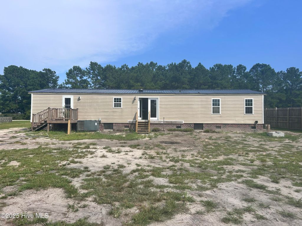 Photo of 383 Woodside Drive, Hampstead, NC 28443 (MLS # 100521772)