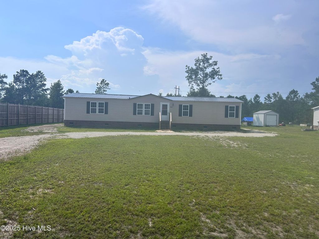 Photo of 383 Woodside Drive, Hampstead, NC 28443 (MLS # 100521772)