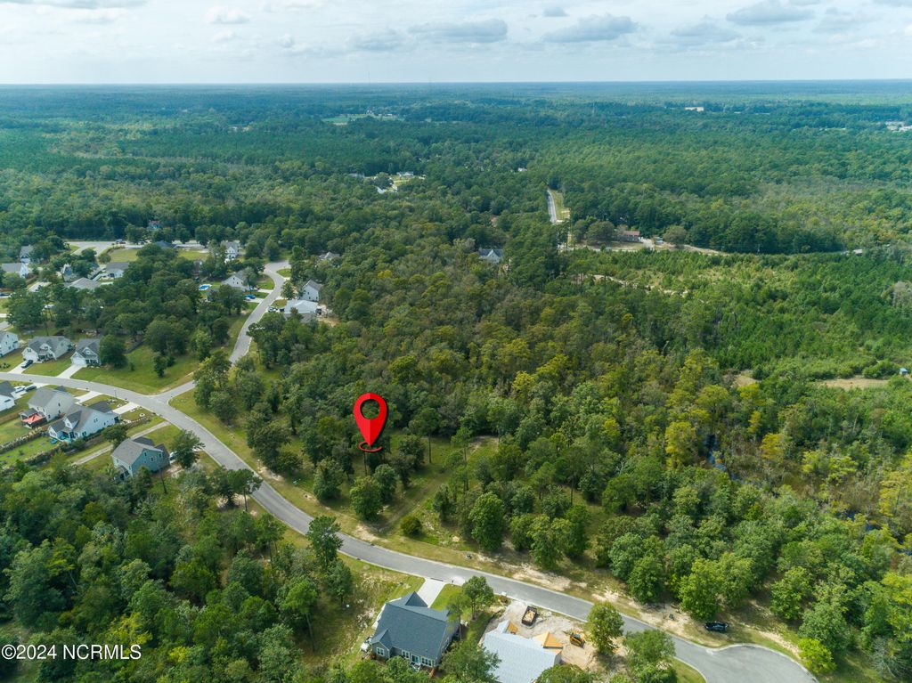 Photo of 571 Sanctuary Point SW, Supply, NC 28462 (MLS # 100466376)
