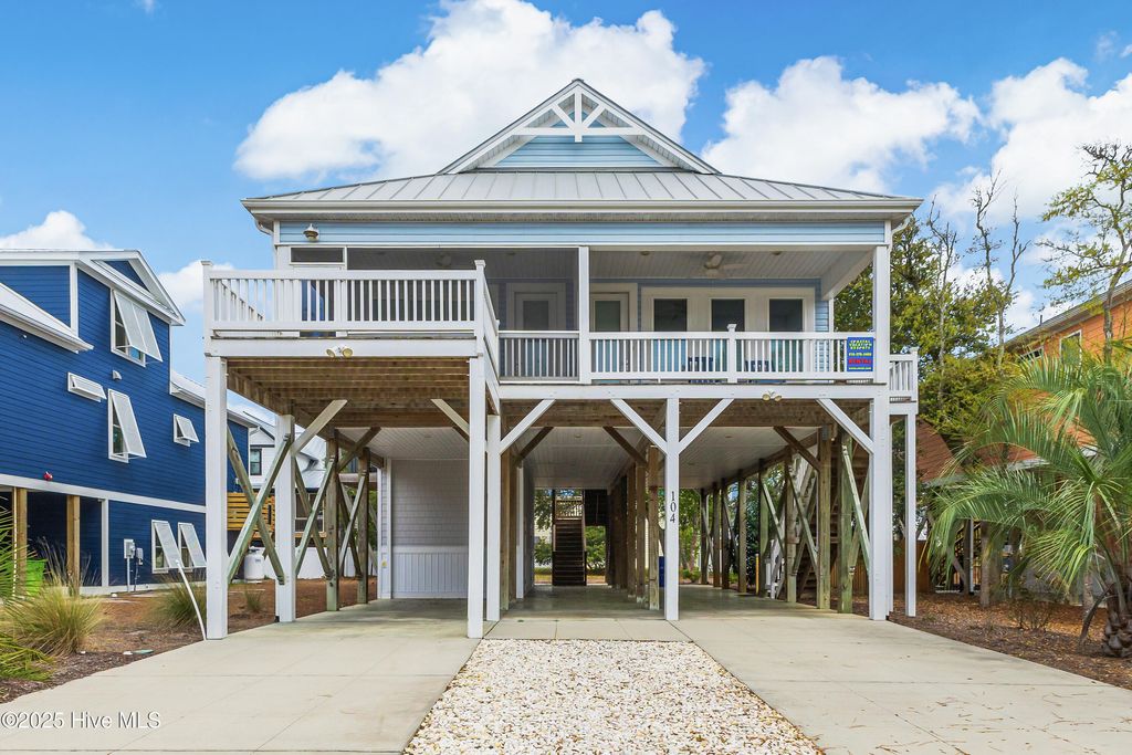 Photo of 104 SE 70th Street, Oak Island, NC 28465 (MLS # 100500117)