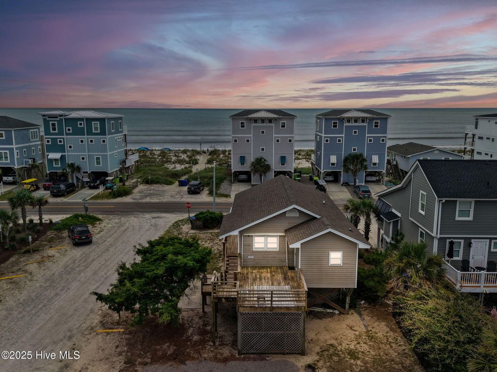 Photo of 930 E Beach Drive, Oak Island, NC 28465 (MLS # 100526809)