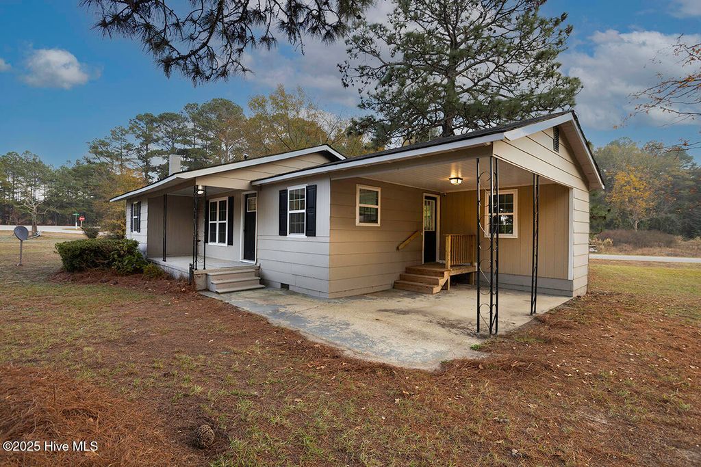 Photo of 4050 Doc Bennett Road, Fayetteville, NC 28306 (MLS # 100542479)