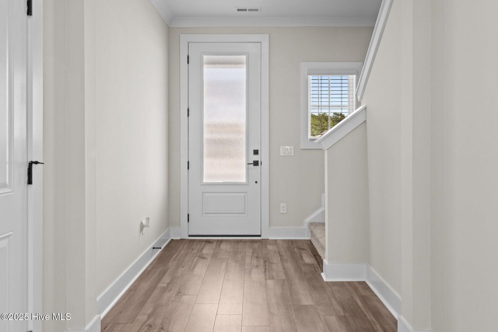 Photo of 28 S Umbrella Palm Drive, Hampstead, NC 28443 (MLS # 100500000)