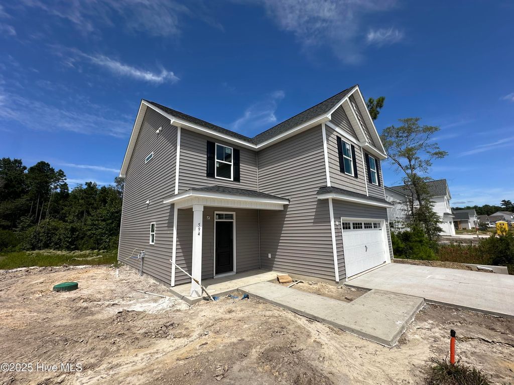 Photo of 594 Poppleton Drive, Hampstead, NC 28443 (MLS # 100511193)