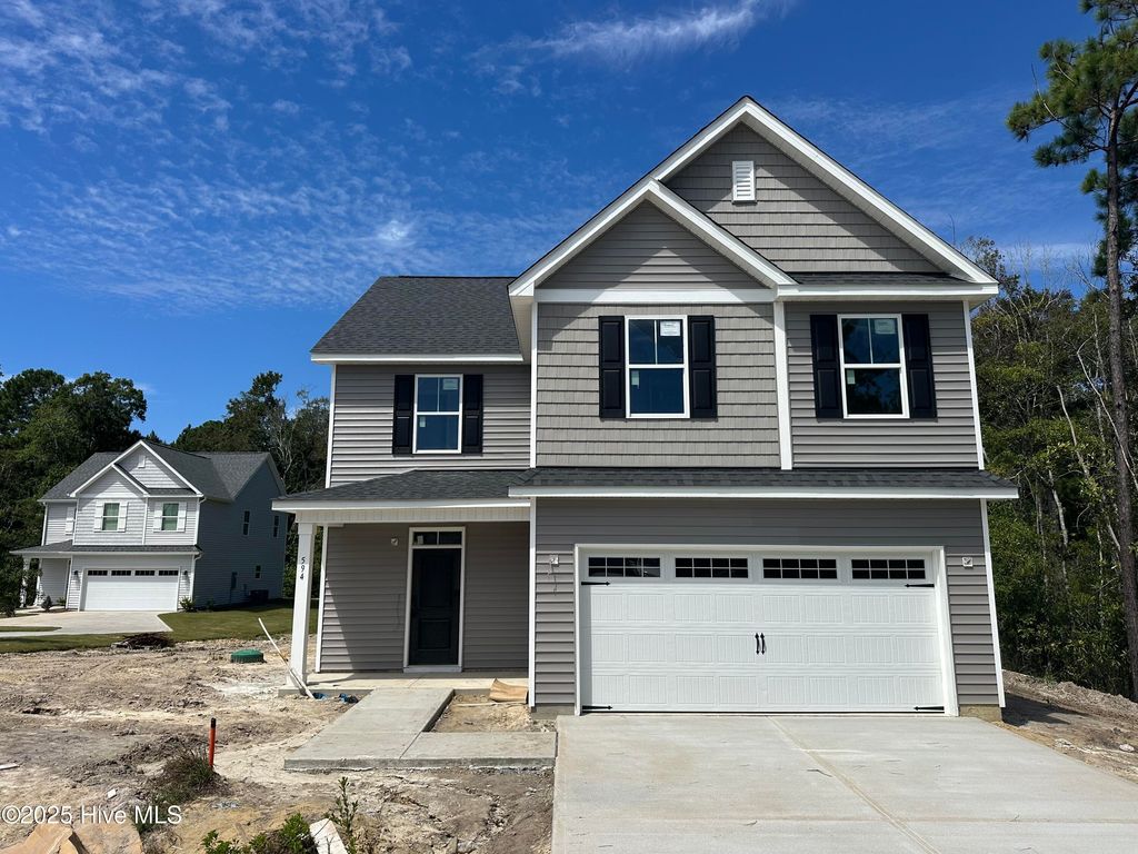 Photo of 594 Poppleton Drive, Hampstead, NC 28443 (MLS # 100511193)