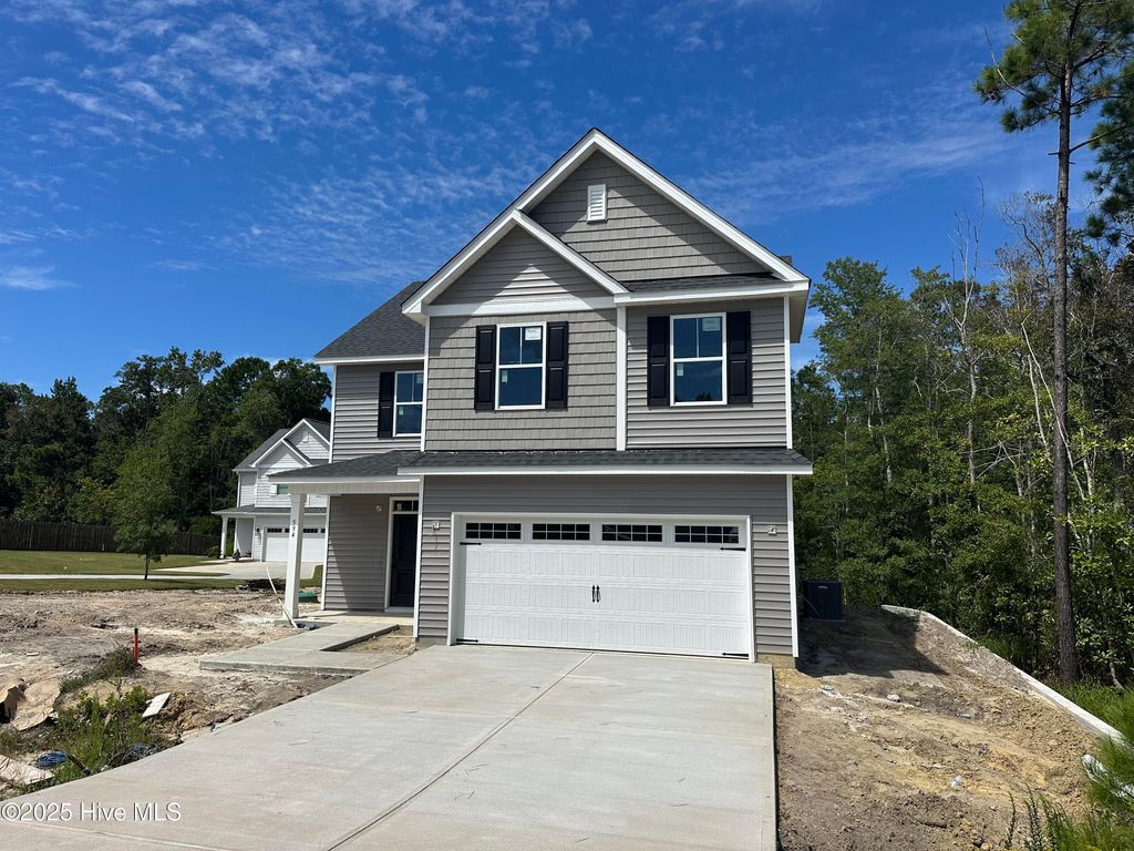 Photo of 594 Poppleton Drive, Hampstead, NC 28443 (MLS # 100511193)
