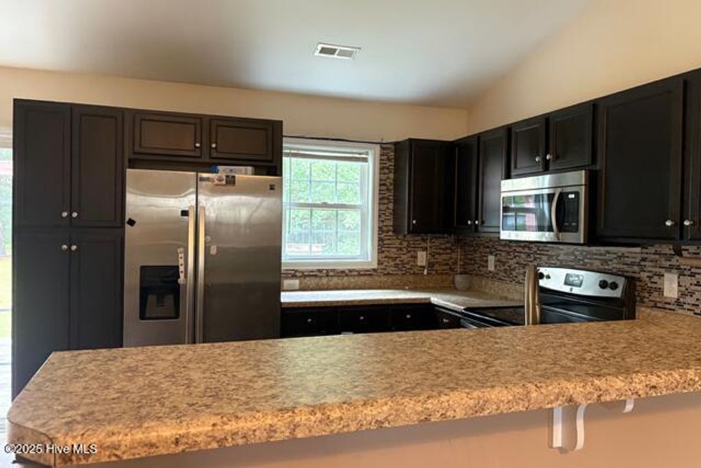 Photo of 131 Marcil Lane, Hampstead, NC 28443 (MLS # 100533477)