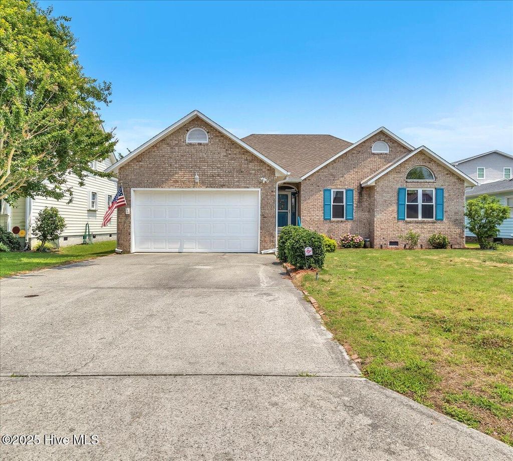 Photo of 734 Sloop Pointe Lane, Kure Beach, NC 28449 (MLS # 100511551)