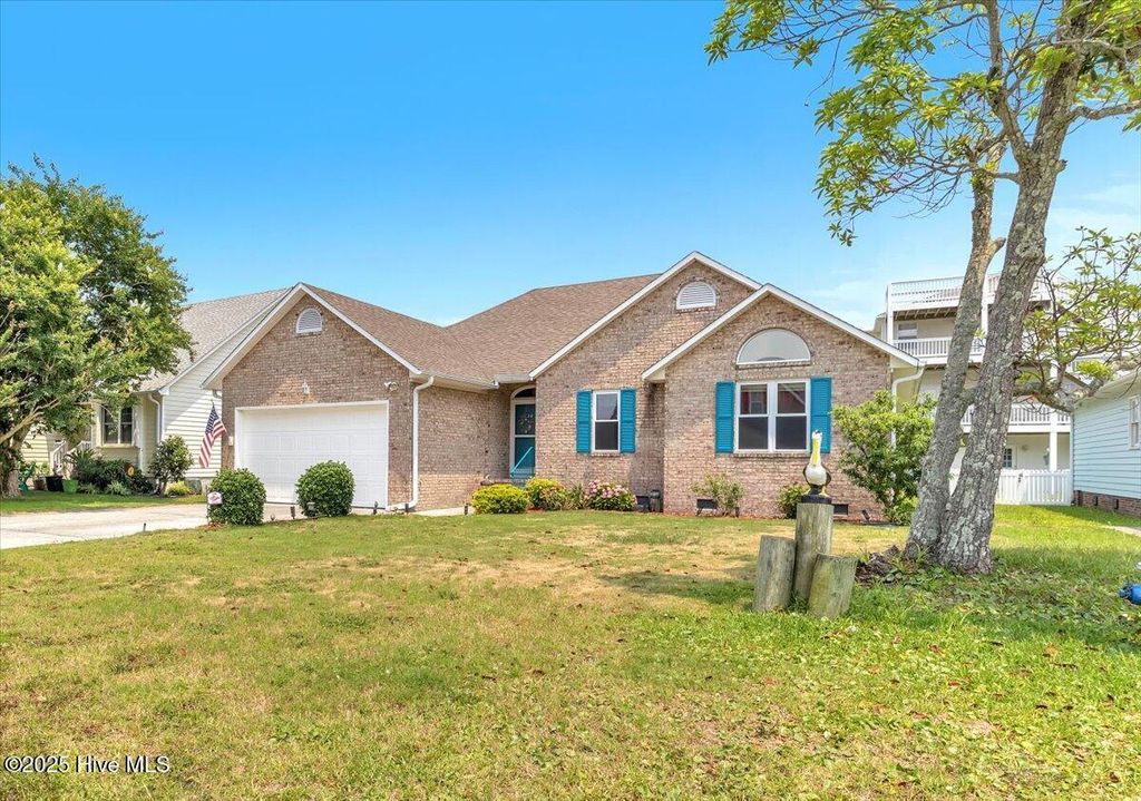 Photo of 734 Sloop Pointe Lane, Kure Beach, NC 28449 (MLS # 100511551)