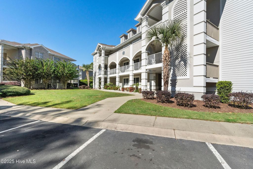 Photo of 908 Resort Circle #205, Sunset Beach, NC 28468 (MLS # 100538017)