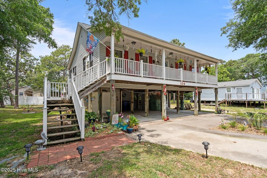 Photo of 109 NE 1st Street, Oak Island, NC 28465 (MLS # 100511803)
