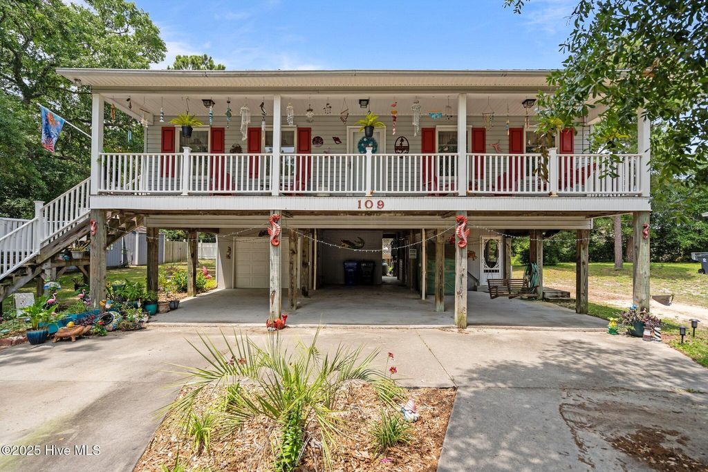 Photo of 109 NE 1st Street, Oak Island, NC 28465 (MLS # 100511803)