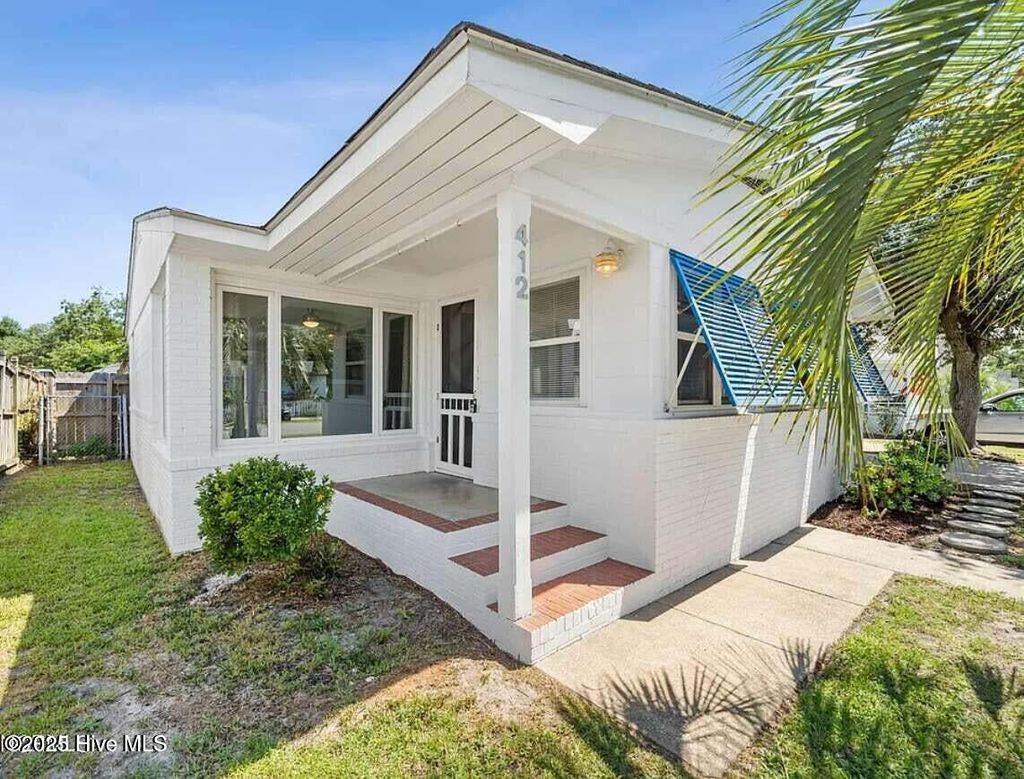 Photo of 412 Raleigh Avenue, Carolina Beach, NC 28428 (MLS # 100531538)