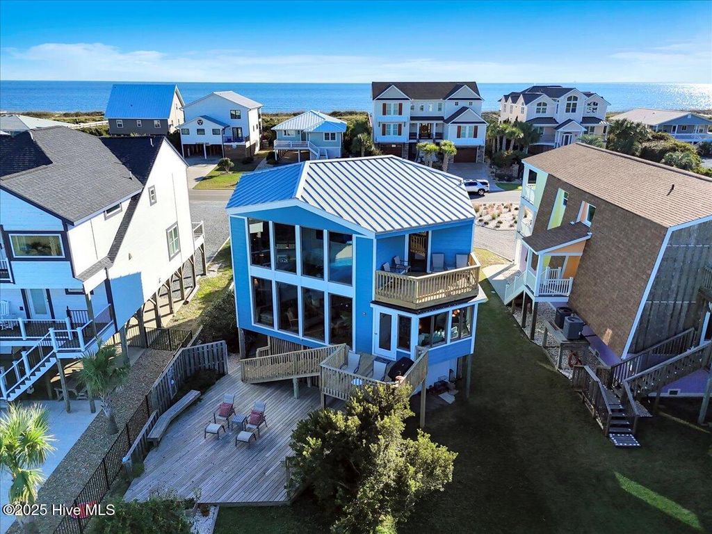 Photo of 318 Caswell Beach Road, Caswell Beach, NC 28465 (MLS # 100537334)