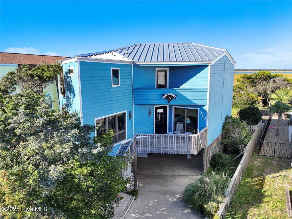 Photo of 318 Caswell Beach Road, Caswell Beach, NC 28465 (MLS # 100537334)