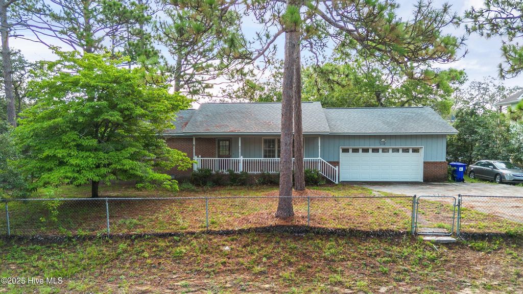 Photo of 214 NE 38th Street, Oak Island, NC 28465 (MLS # 100522837)