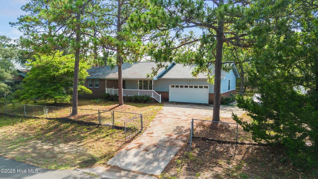 Photo of 214 NE 38th Street, Oak Island, NC 28465 (MLS # 100522837)
