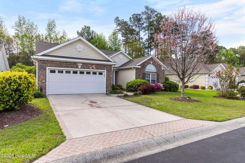 Photo of 907 Corn Planters Circle, Carolina Shores, NC 28467 (MLS # 100499573)