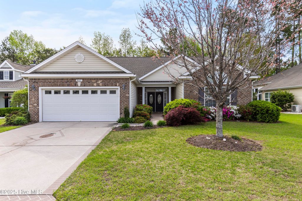Photo of 907 Corn Planters Circle, Carolina Shores, NC 28467 (MLS # 100499573)
