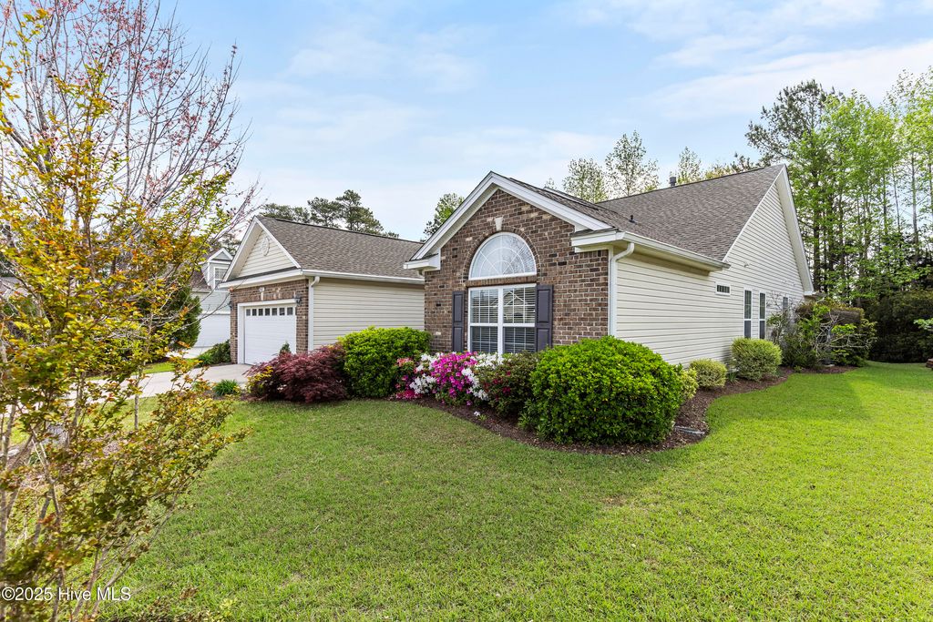 Photo of 907 Corn Planters Circle, Carolina Shores, NC 28467 (MLS # 100499573)
