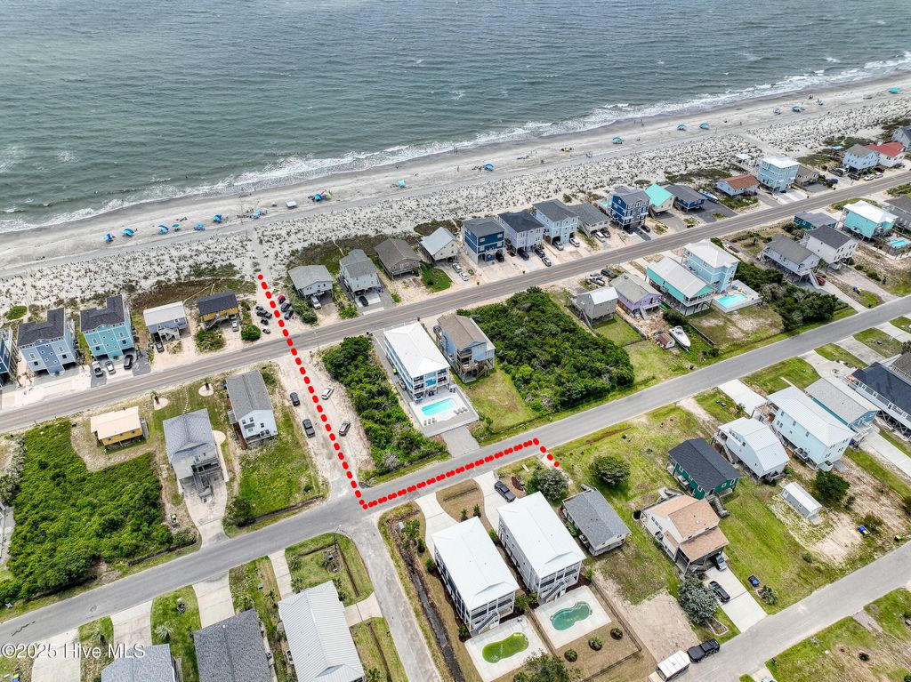 Photo of 3526 E Dolphin Drive, Oak Island, NC 28465 (MLS # 100520614)