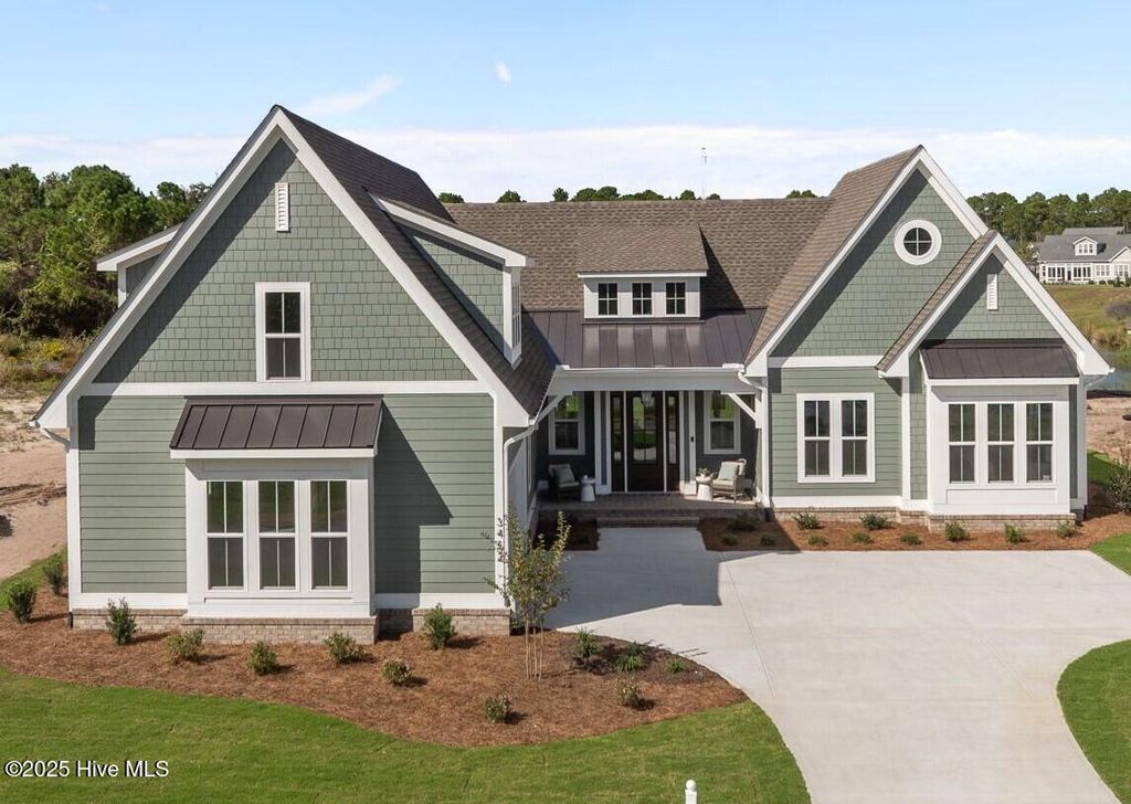 Photo of 3452 St James Drive SE, Southport, NC 28461 (MLS # 100535593)