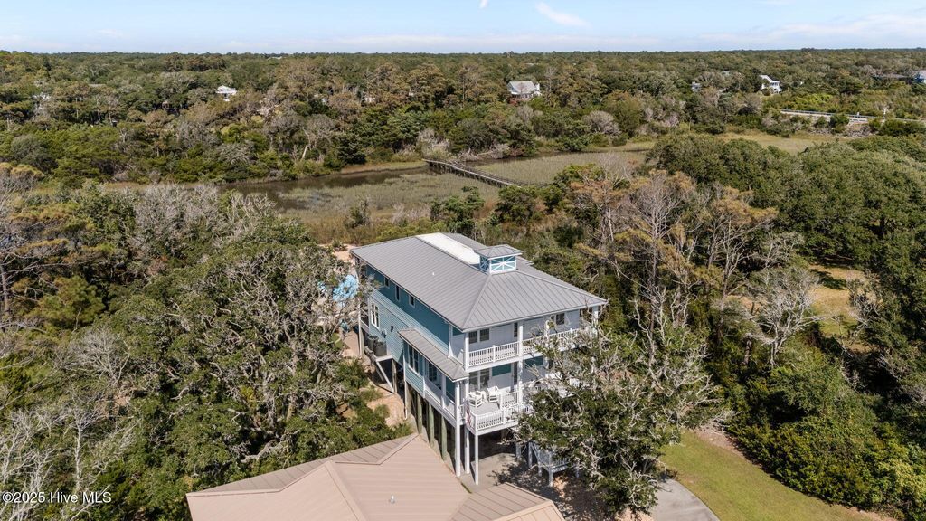 Photo of 124 W Pelican Drive, Oak Island, NC 28465 (MLS # 100531210)