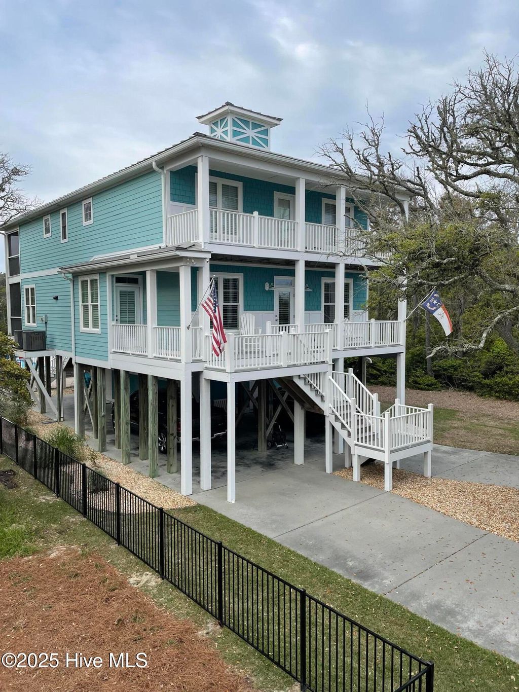 Photo of 124 W Pelican Drive, Oak Island, NC 28465 (MLS # 100531210)