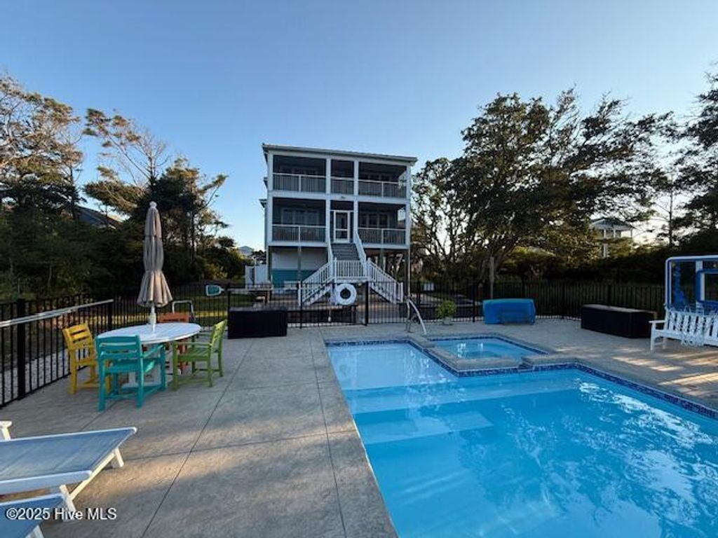 Photo of 124 W Pelican Drive, Oak Island, NC 28465 (MLS # 100531210)