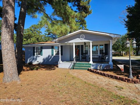 Photo of 502 Raleigh Road, Clinton, NC 28328 (MLS # 100536612)