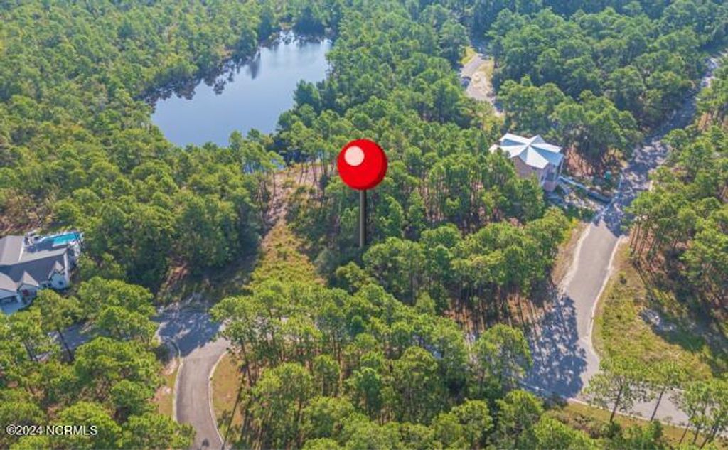 Photo of 1528 St Vincent Drive SW, Shallotte, NC 28470 (MLS # 100459914)