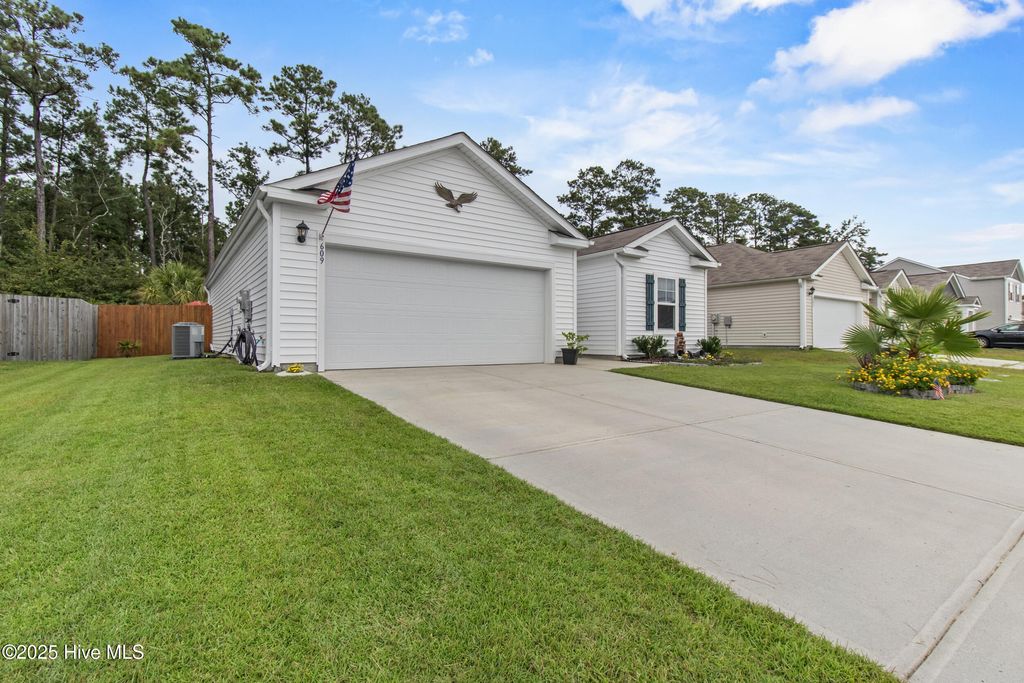 Photo of 609 Draymore Drive NE, Leland, NC 28451 (MLS # 100534140)