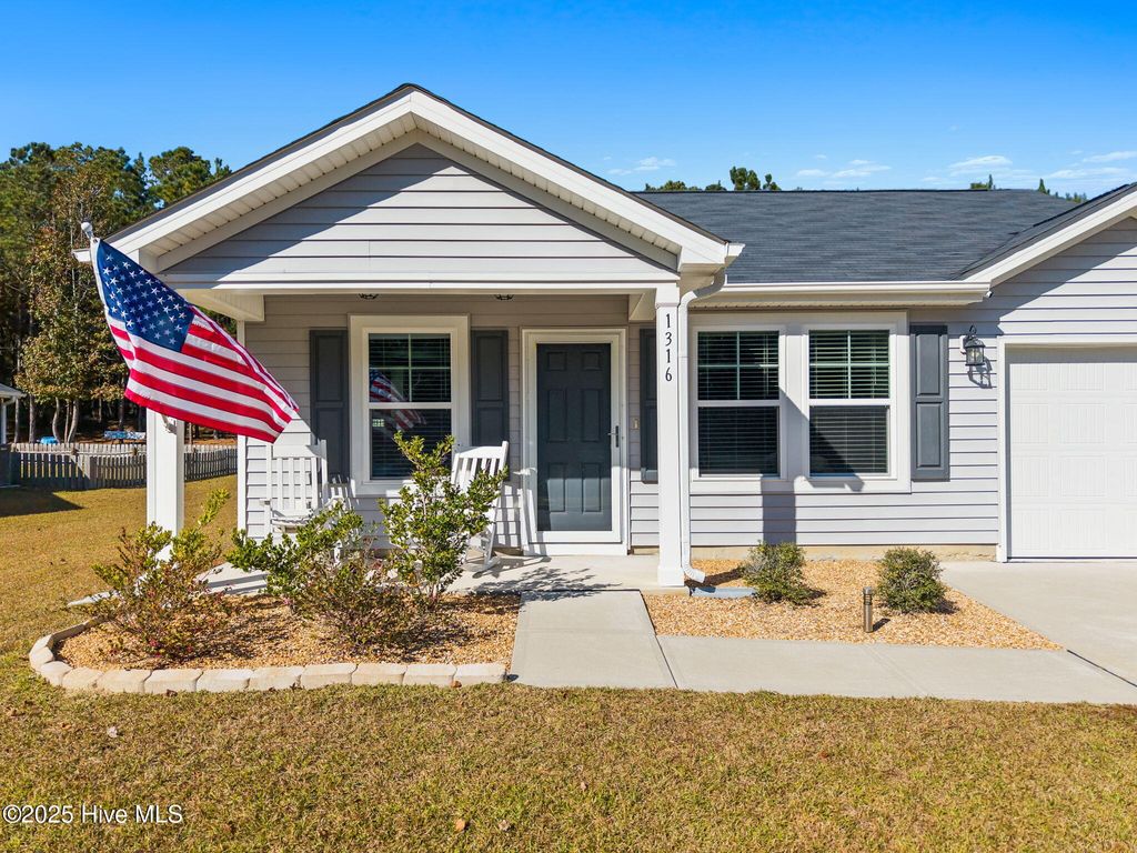 Photo of 1316 N Fisher King Drive SE, Bolivia, NC 28422 (MLS # 100541238)