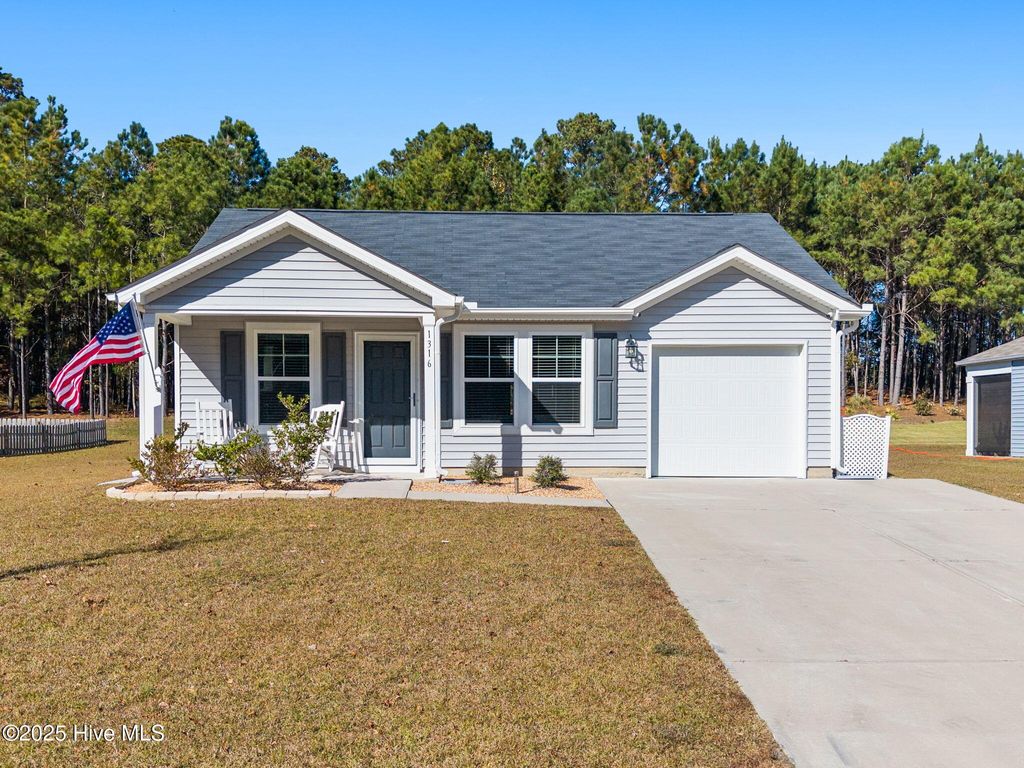 Photo of 1316 N Fisher King Drive SE, Bolivia, NC 28422 (MLS # 100541238)