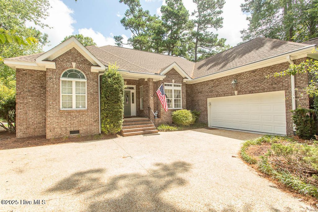 Photo of 134 Windsor Circle SW, Ocean Isle Beach, NC 28469 (MLS # 100521008)